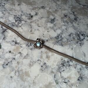 Flower Pandora bead with blue stone